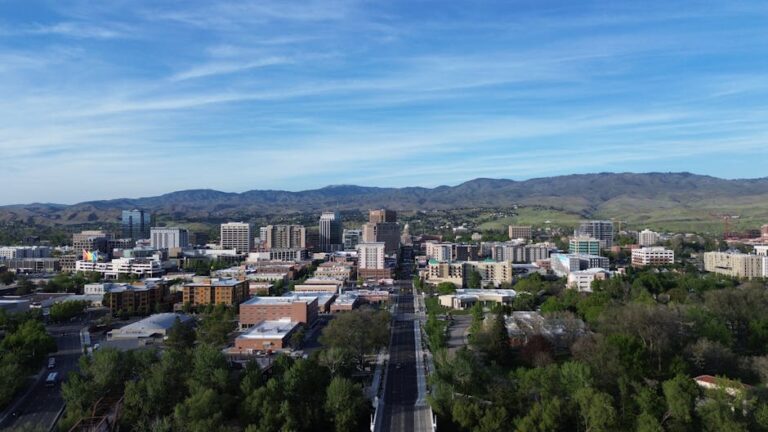 Stunning aerial capture of Boise, Idaho skyline with mountains in the background.