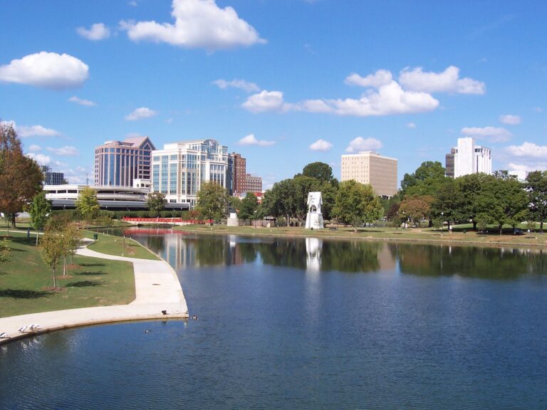 Downtown Huntsville office towers seen across the lake at Big Spring International Park.