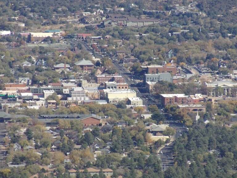 Elevated view of downtown Prescott, Arizona, with brick commercial blocks surrounded by tree-lined residential streets