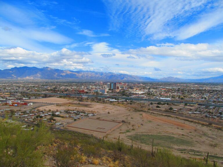 Downtown Tucson and the Santa Catalina Mountains seen from Sentinel Peak, with I-10 and desert scrub in the foreground