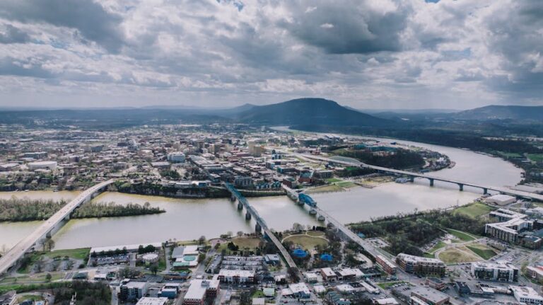 Aerial shot of Chattanooga, Tennessee, showcasing the city skyline and Tennessee River.